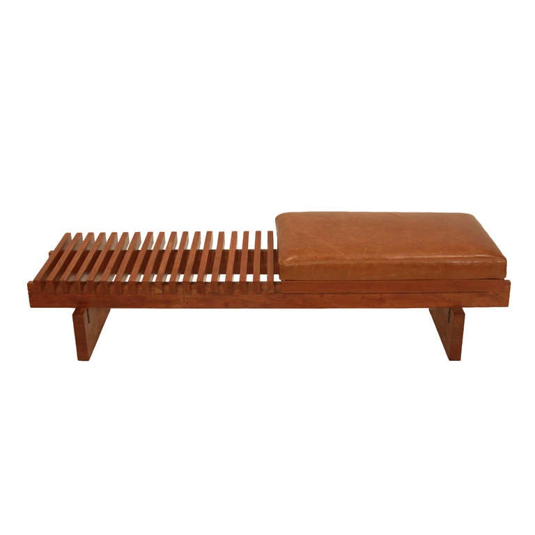 A slatted, sturdy and architectural bench from Brazil with a distressed caramel leather seat. The slats and base are made of solid Caviuna and have metal bracket supports.
Many pieces are stored in our warehouse, so please click on CONTACT DEALER