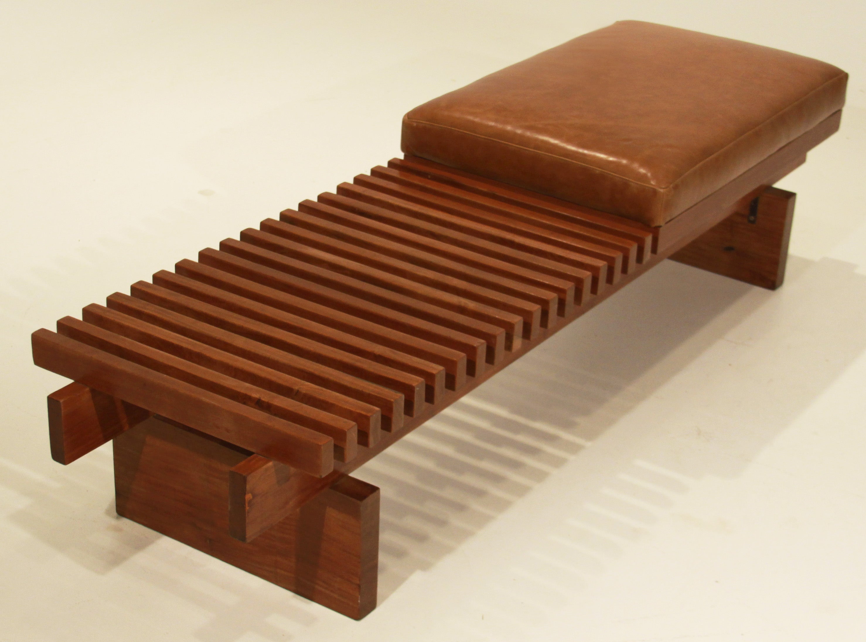 Slatted solid Caviuna bench with leather seat and solid wood base