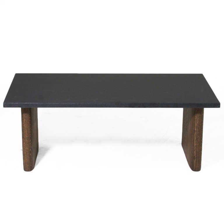 A stunning side table in Solid Oak with a charcoal oil finish with a honed black granite top with narrow rectangular legs with rounded edges.

This item is available for custom order and the lead time is 6-8 weeks; sometimes we are able to