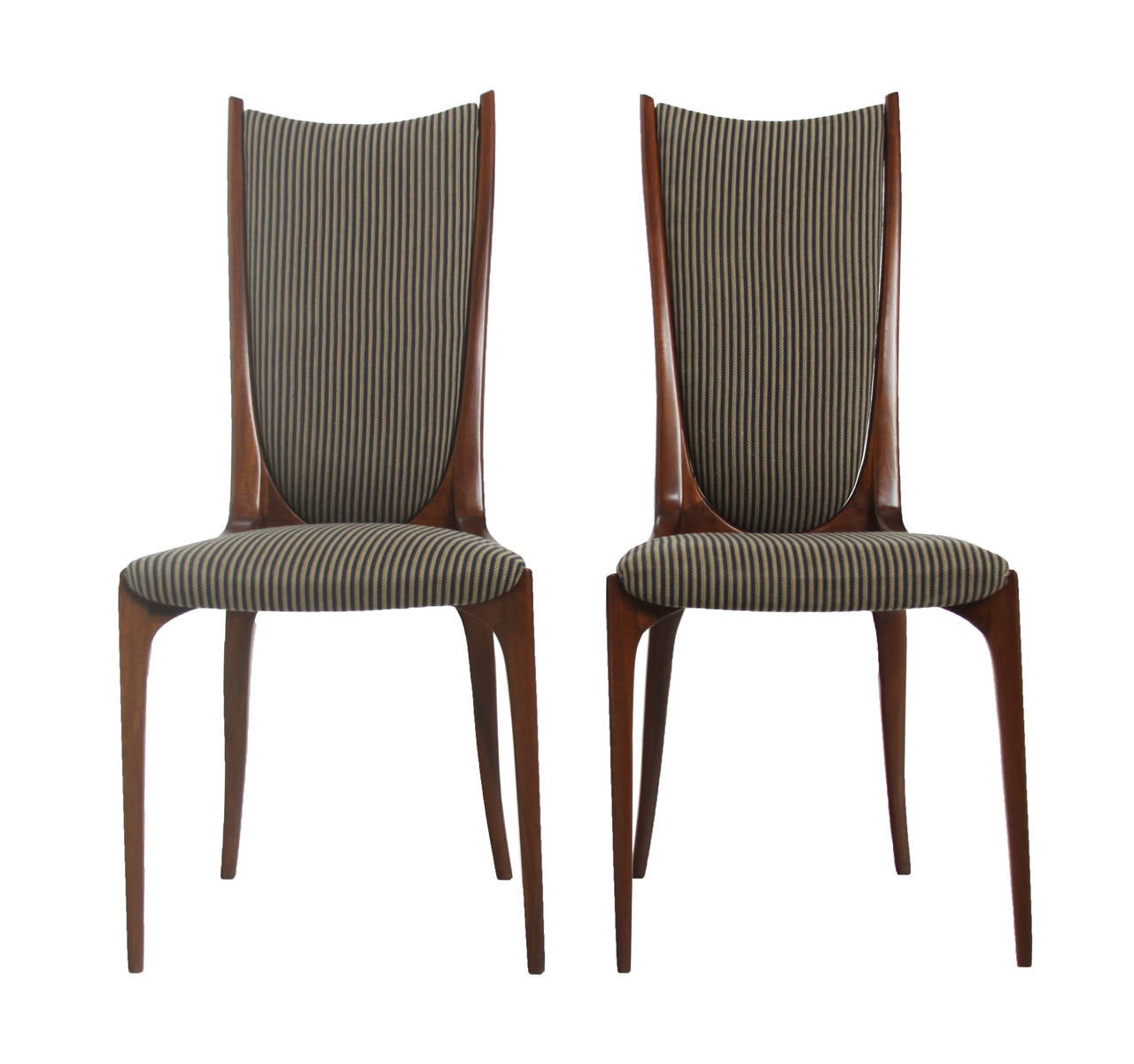 A beautiful pair of sculptural, high-backed chairs in the style of Giuseppe Scapinelli. These chairs are solid Caviuna and have been upholstered in striped fabric.

Many pieces are stored in our warehouse, so please click on CONTACT DEALER under