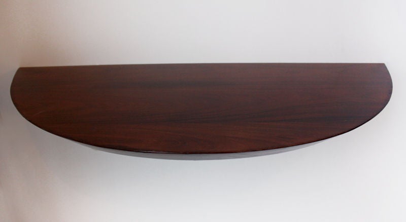 Pair of Brazilian Rosewood crescent floating shelves In Good Condition In Hollywood, CA