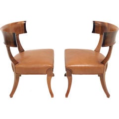 Pair of Walnut Klismos chairs in caramel leather