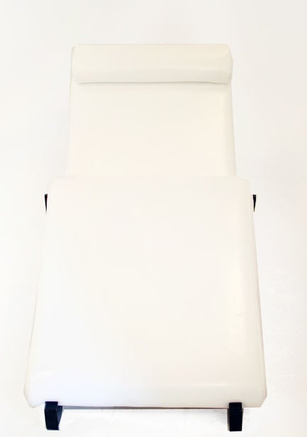 A reclining longue chairs with solid rosewood legs with bolster and white leather by Guto Lacaz. Bolster fastens in the back with velcro.

Seat Depth: 13".

Many pieces are stored in our warehouse, so please click on Contact Dealer under