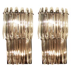 Pair Of Curved Cut Glass And Bronze Sconces
