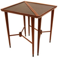 Pair of triangle caviuna side tables with leather tops