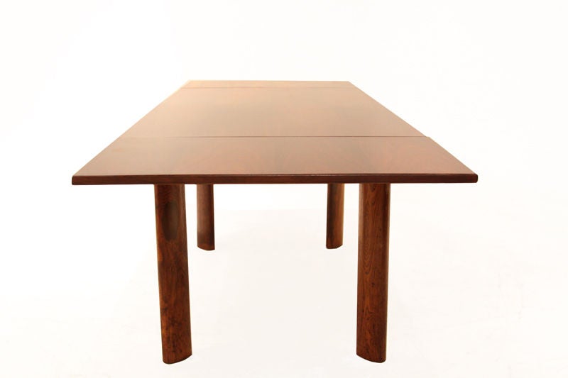 Brazilian Dining table by Jean Gillon in rosewood with solid legs For Sale