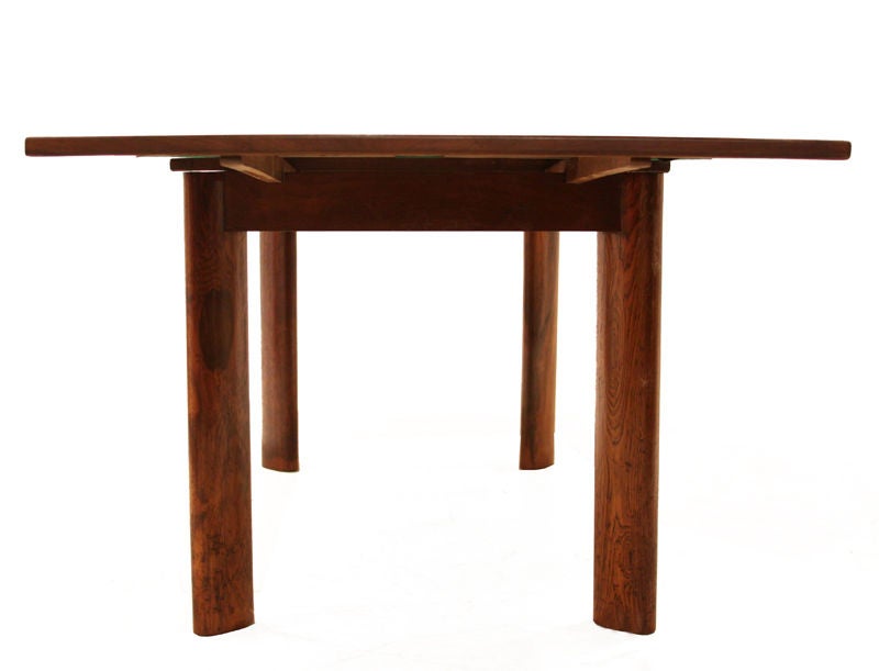 Dining table by Jean Gillon in rosewood with solid legs In Good Condition For Sale In Hollywood, CA
