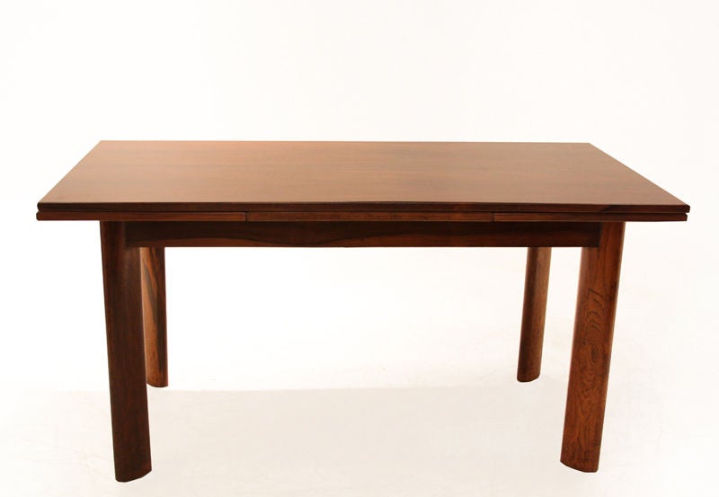 Mid-20th Century Dining table by Jean Gillon in rosewood with solid legs For Sale