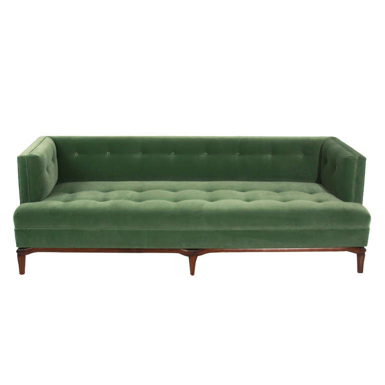 Custom Walnut and tufted green mohair sofa by Thomas Hayes Studio. The sofa has a solid Walnut base and elegantly tapered legs. The cushions have been upholstered in a green mohair but may also be ordered in off-white linen  choice and priced as