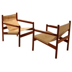 Pair of Roxinho wood leather sling chairs by Michel Arnoult