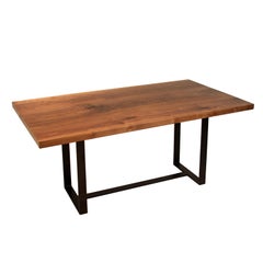 Solid Walnut slab dining table by Thomas Hayes Studio