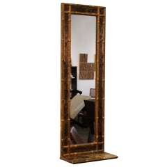 Gilded faux bamboo mirror with shelf