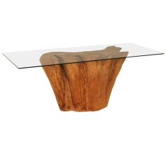 Solid tree trunk console by Michael Taylor