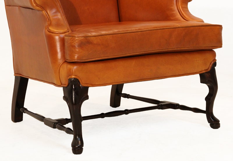 20th Century Pair of Leather Wing Back Chairs with Solid Sculptural Feet