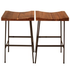 Pair of carved Walnut and Rosewood stools by Thomas Hayes Studio
