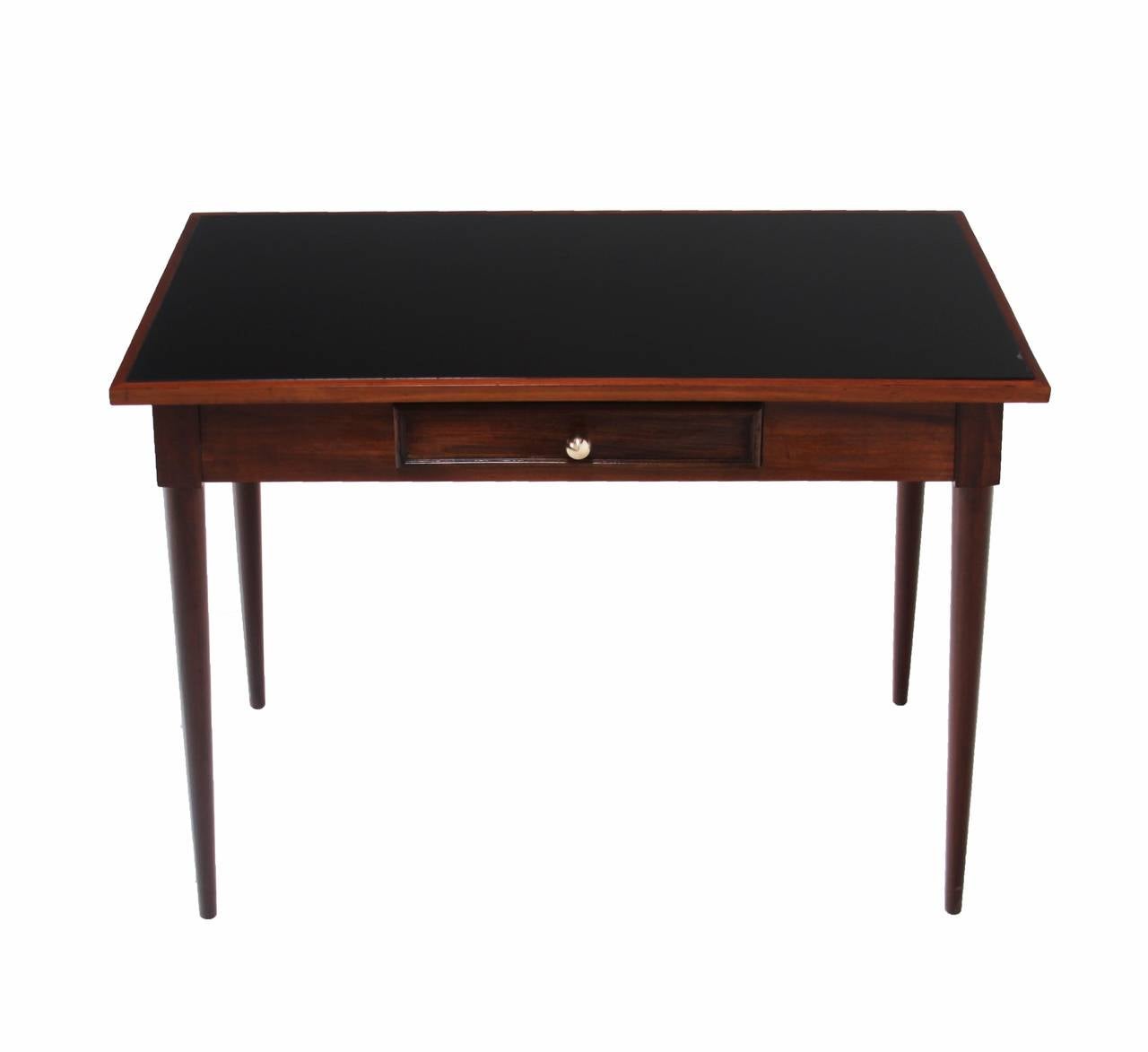 A vintage Freijo wood desk or console table from Brazil by Giuseppe Scapinelli for Moveis Tepperman with tapered legs, reverse painted black glass top, and a single drawer with polished brass pull.

In order to preserve our inventory, after