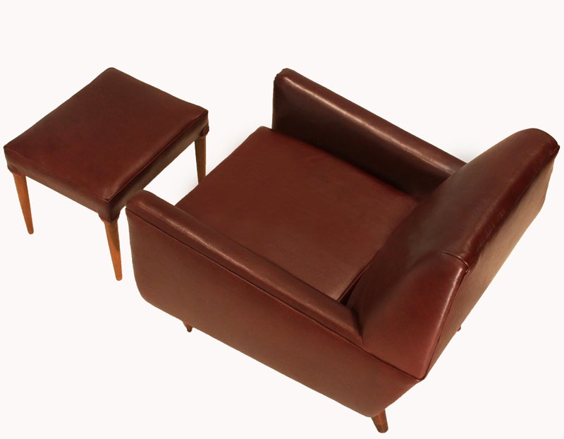 Mid-20th Century Brazilian Modernist Leather Lounge Chair and Ottoman with Conical Caviuna Legs For Sale