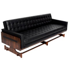 Brazilian tufted black leather and Rosewood sofa by Forma