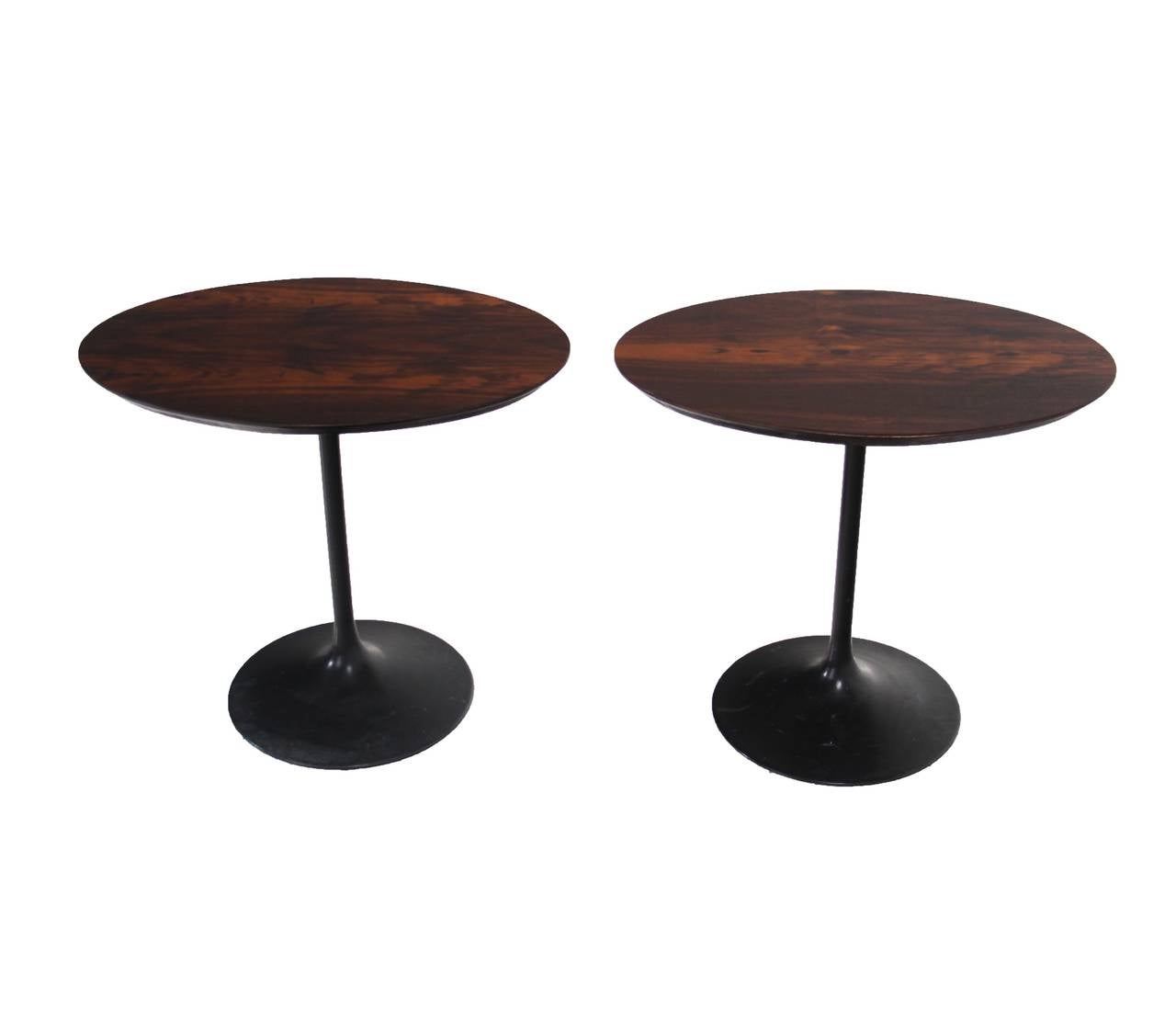 A pair of Brazilian Rosewood topped side tables with ebonized tulip bases. 

Many pieces are stored in our warehouse, so please click on CONTACT DEALER under our logo below to find out if the pieces you are interested in seeing are on the gallery