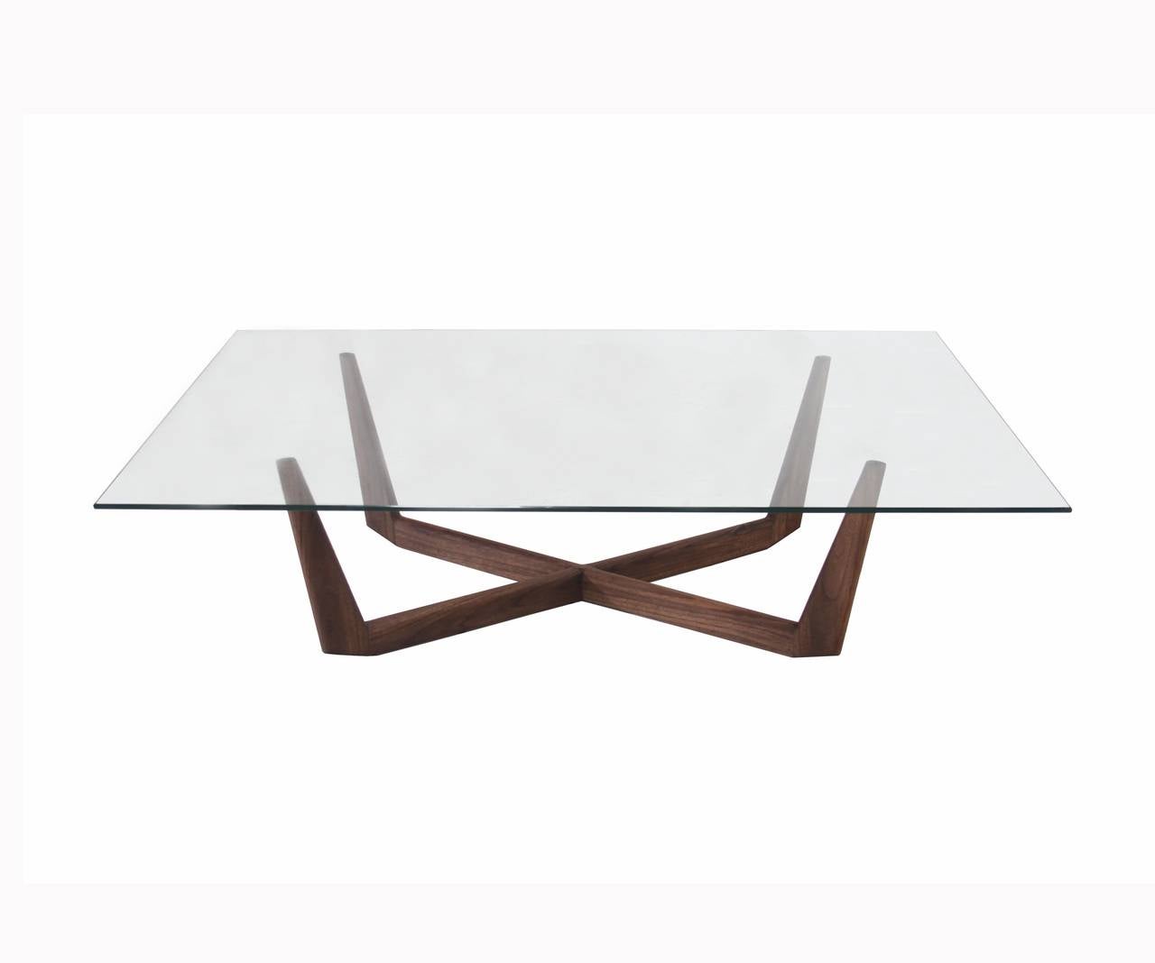 A solid Walnut sculptural base coffee table supporting a rectangular glass top. The size of the glass top can be changed if needed.

This item is available immediately 

NOTE: The oil finishes are flat, water proof and penetrate deeply, bonding