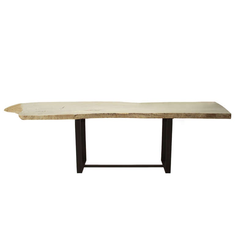 A custom dining table by Thomas Hayes Studio with top of bleached, highly figural old-growth Oak. The table has a beautiful knots, crotches, and live edges. The base is solid steel finished in flat black.
Many pieces are stored in our warehouse, so