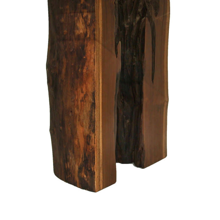 Glass Ipe trunk pedestal dining table with glass top by Tunico T.