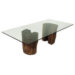 Ipe trunk pedestal dining table with glass top by Tunico T.