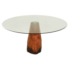 Circular Peroba Rosa pedestal-base dining table by Tunico T.