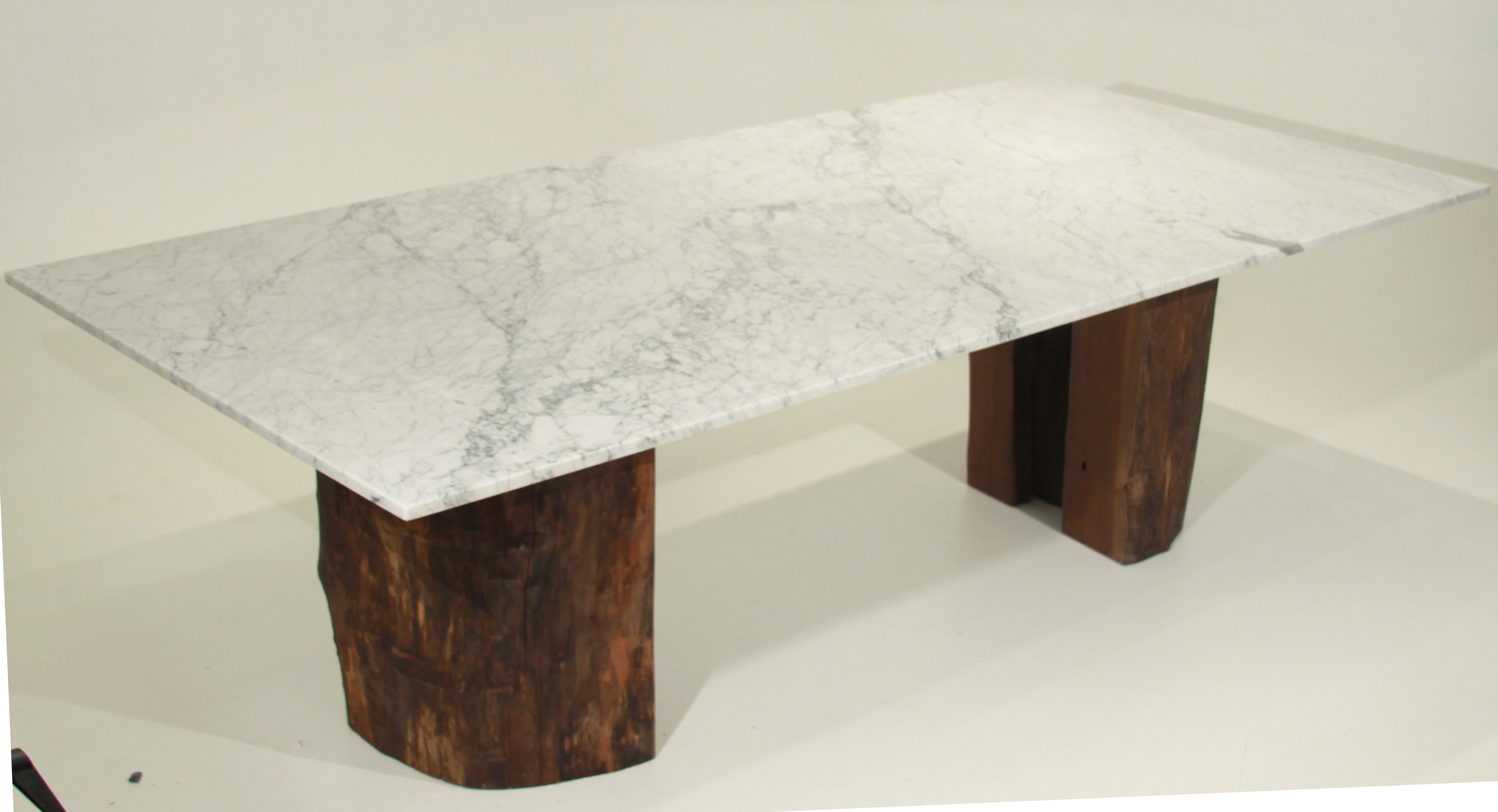 Ipe trunk pedestal dining table with marble top by Tunico T.