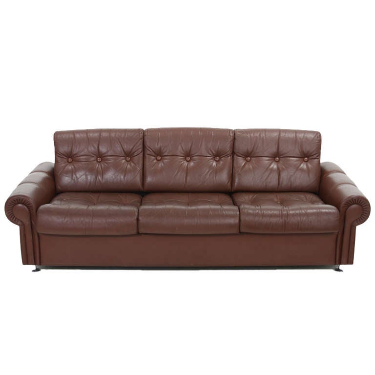 1960's sofa from Sweden with original distressed leather with chrome trumpet feet. Very comfortable. 

Many pieces are stored in our warehouse, so please click on CONTACT DEALER under our logo below to find out if the pieces you are interested in