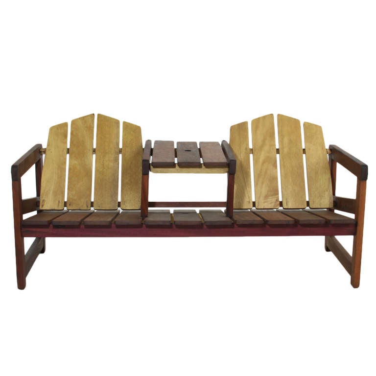 A beautiful solid Brazilian wood outdoor bench in the 