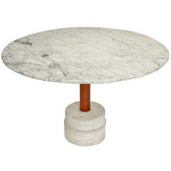 A French Marble And Leather Dining Table With Scored Marble Base