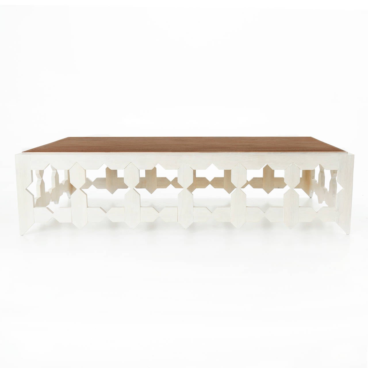 A rectangular coffee table in Walnut with natural top and bleached sides with star cut-out designs. 

Many pieces are stored in our warehouse, so please click on CONTACT DEALER under our logo below to find out if the pieces you are interested in