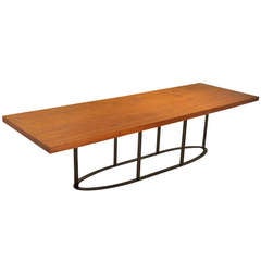 Custom Cumaru wood "Colyer" dining table w/ oval base by Thomas Hayes Studio