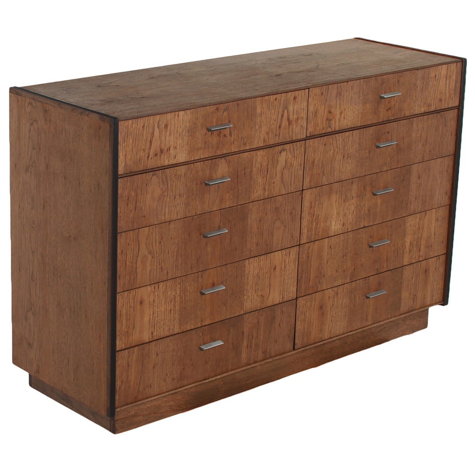 Vintage Oak Dresser with Sleek Pulls and Recessed Base