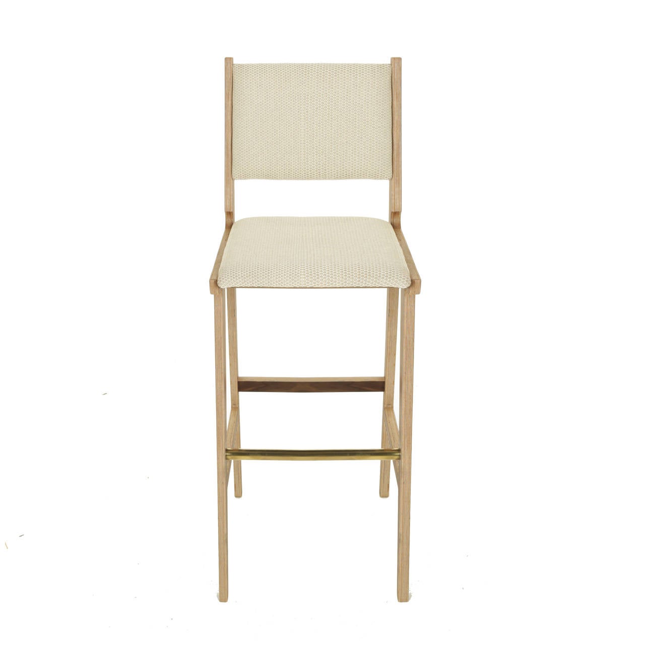 A sculptural bar stool in Baltic Birch plywood available for custom order by Thomas Hayes Studio inspired by the designs of Martin Eisler with comfortable upholstered seat and floating back. The stools have a beautiful detail at the back of the seat