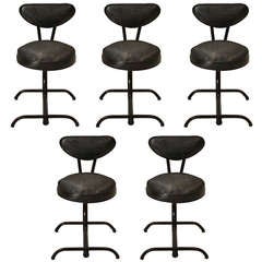 Set of 5 vintage iron and black sharkskin vinyl low stools