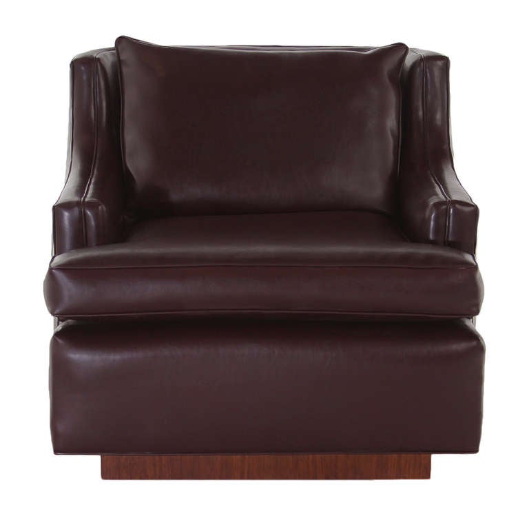American Pair of Low Arch Back Leather Lounge Club Chairs with a Solid Walnut Base