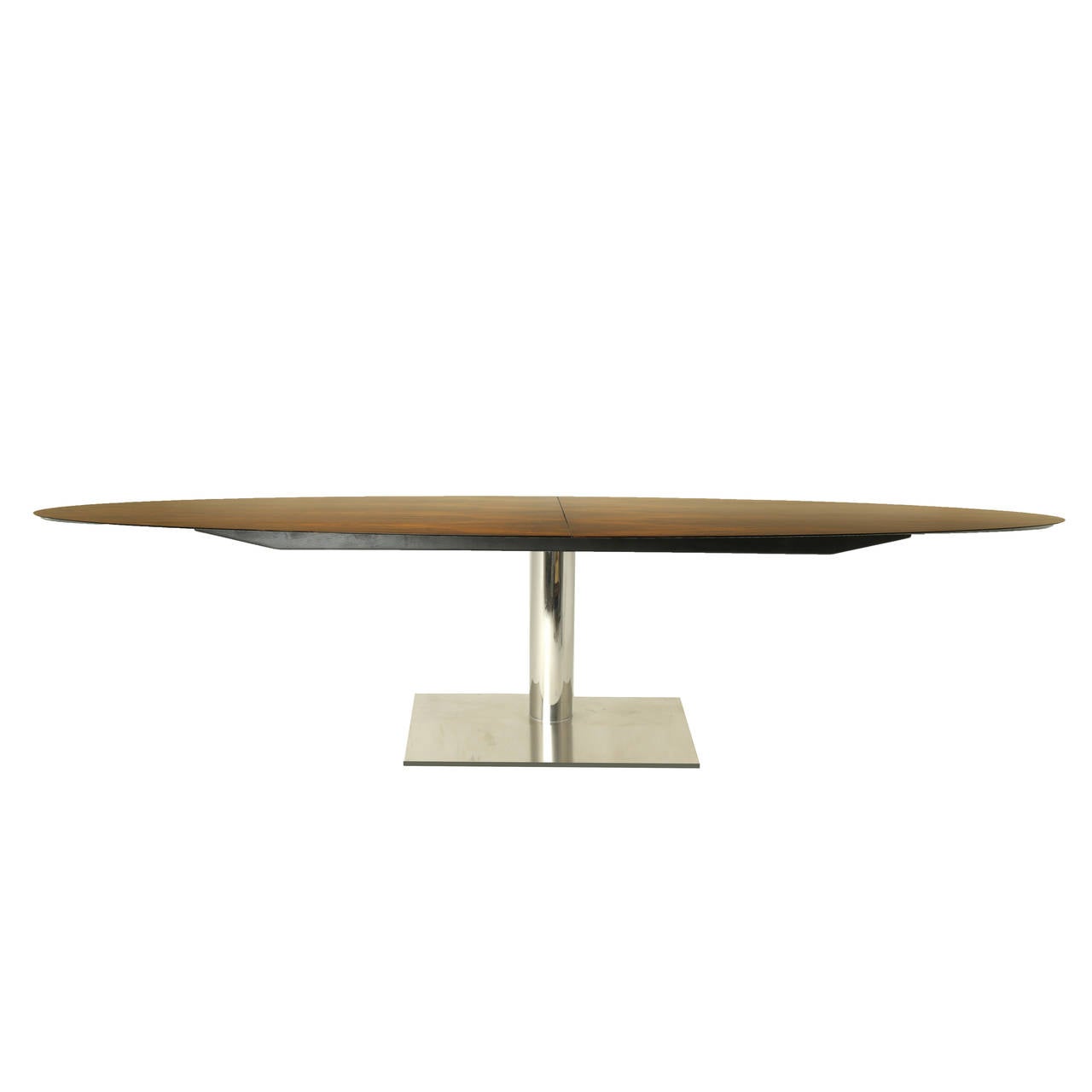 An elegant Brazilian Imbuia wood dining table from Brazil. The base is Stainless Steel. The base is sturdy and very stable. Grain on the Imbuia top is mirrored essentially. 

   