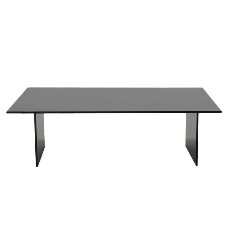 Custom flat black steel base coffee table with reverse painted black glass top available for custom order. 

Many pieces are stored in our warehouse, so please click on CONTACT DEALER under our logo below to find out if the pieces you are