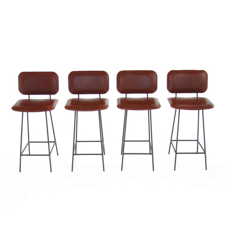 Steel Framed Sculptural Bar stools with upholstered seat and back by Thomas Hayes Studio. 

Available for custom order and the lead time is 6-8 weeks; sometimes we are able to complete projects faster, so please contact us to inquire.

The price