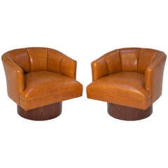 Pair Of Caramel Leather And Rosewood Swivel Chairs