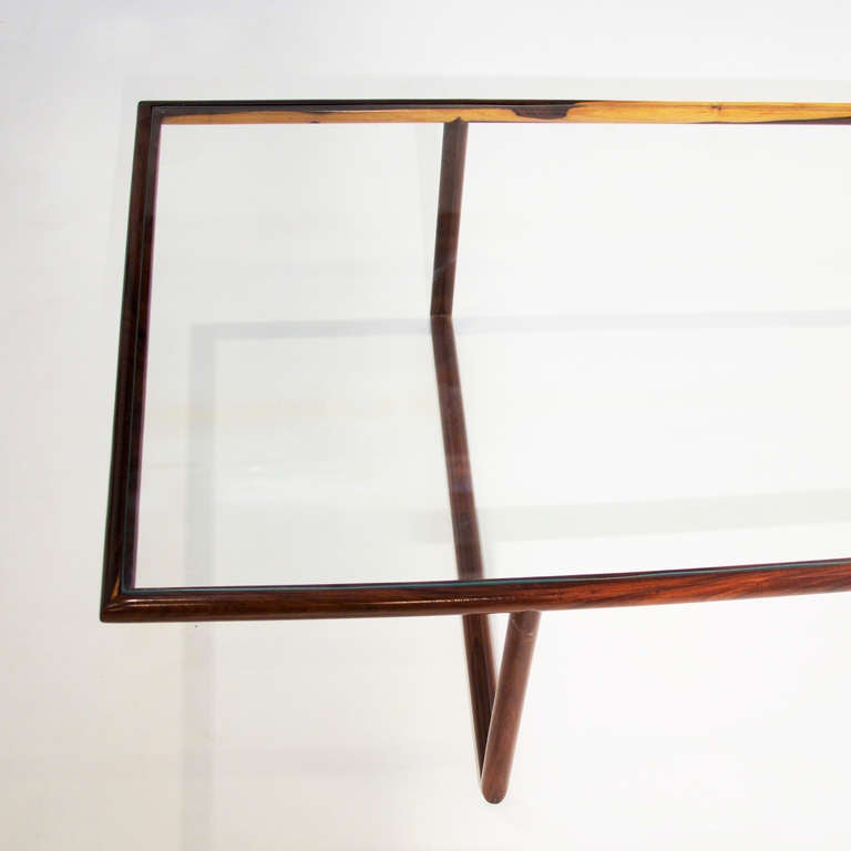 Glass Rosewood & glass coffee table by Joaquim Tenreiro