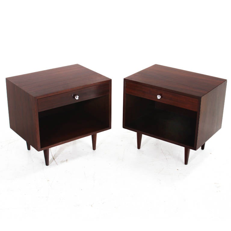 A pair of lovely Walnut night stands by Harvey Probber with single drawers and round chrome drawer pulls.

Many pieces are stored in our warehouse, so please click on CONTACT DEALER under our logo below to find out if the pieces you are interested