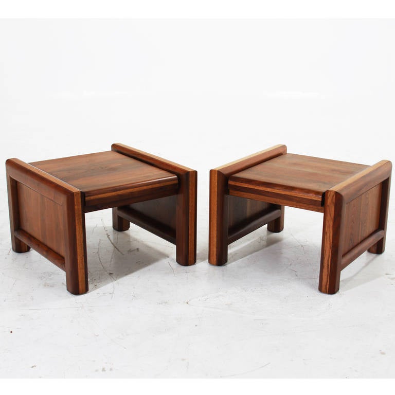 A pair of vintage side tables or end tables in solid Walnut with strips of solid Oak in the sides. Two larger side tables of different sizes with single drawers are also available in other listings. 

Many pieces are stored in our warehouse, so