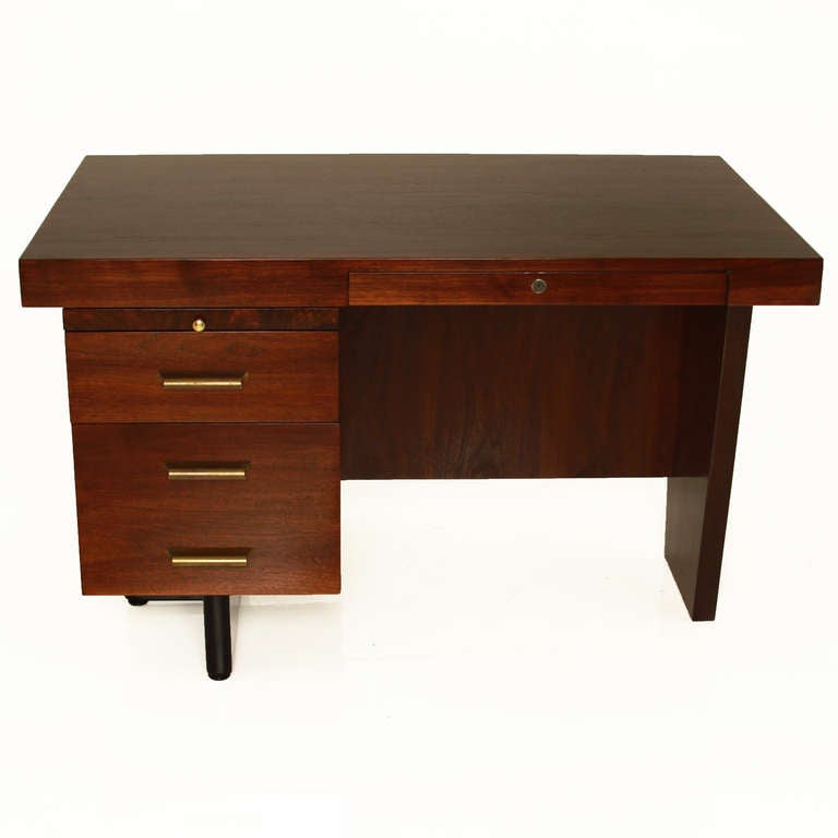 A vintage Walnut desk with original antique bronze hardware and black finished legs. The design is petite and attractive. 

Many pieces are stored in our warehouse, so please click on “Contact Dealer” button under our logo below to find out if the