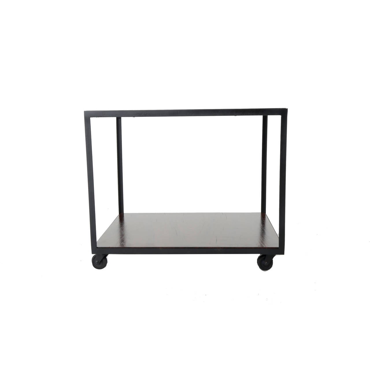 A versatile rolling side table or cart made from Rosewood and Steel from Brazil, with lower shelf for additional storage.

Many pieces are stored in our warehouse, so please click on CONTACT DEALER under our logo below to find out if the pieces