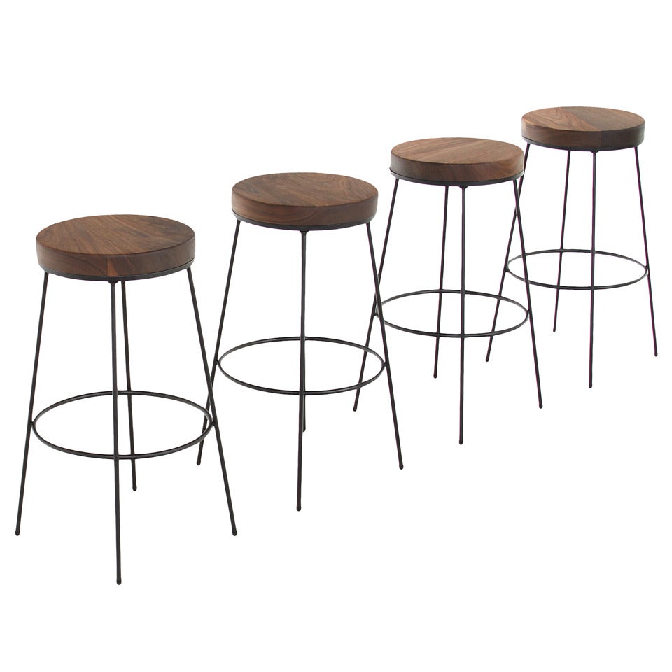 The Galli Swiveling Walnut Bar Stools