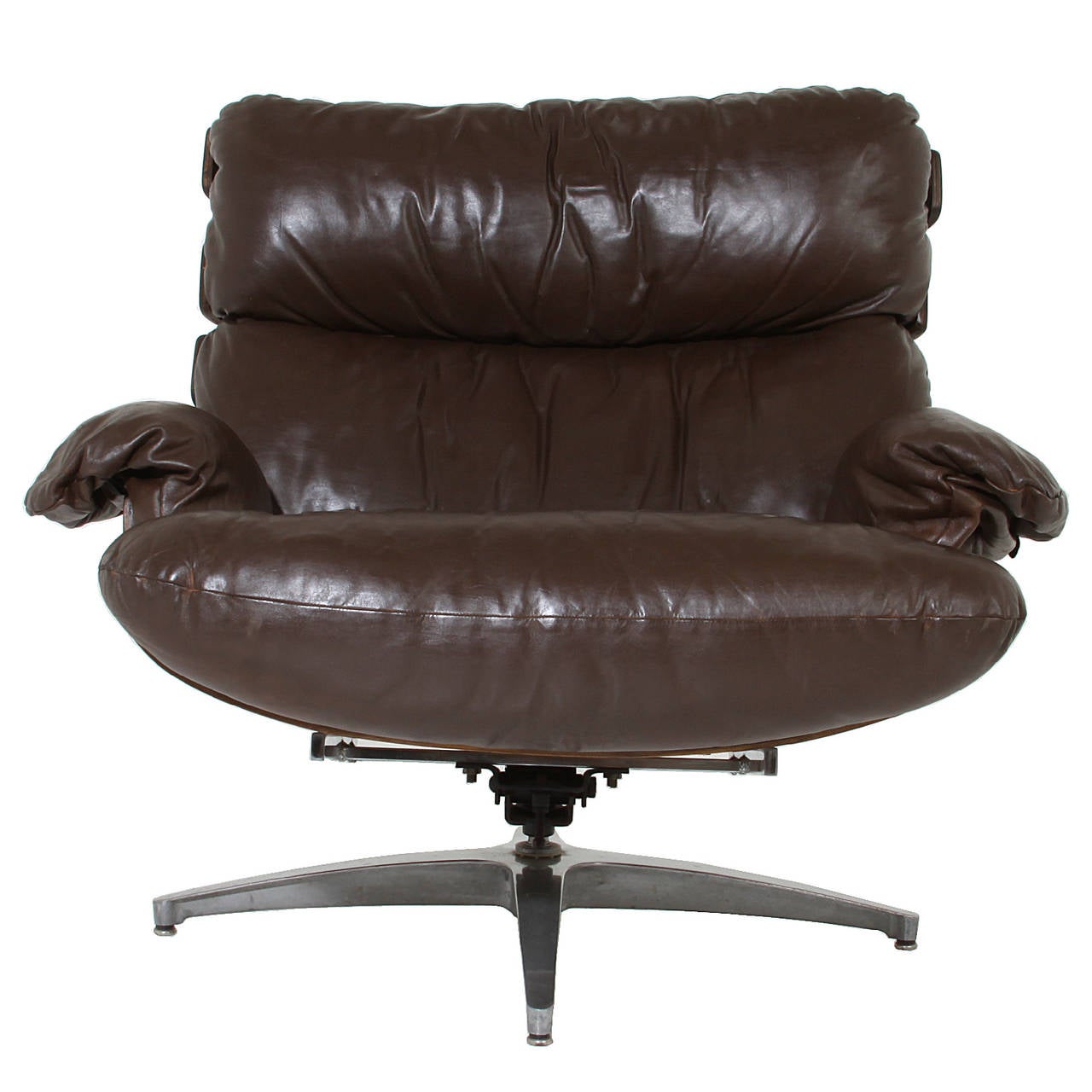 A comfortable and rare lounge chair by Directional with bent Rosewood frame and original leather upholstery. The chair swivels and rocks atop an original Chrome base. 

Many pieces are stored in our warehouse, so please click on CONTACT DEALER