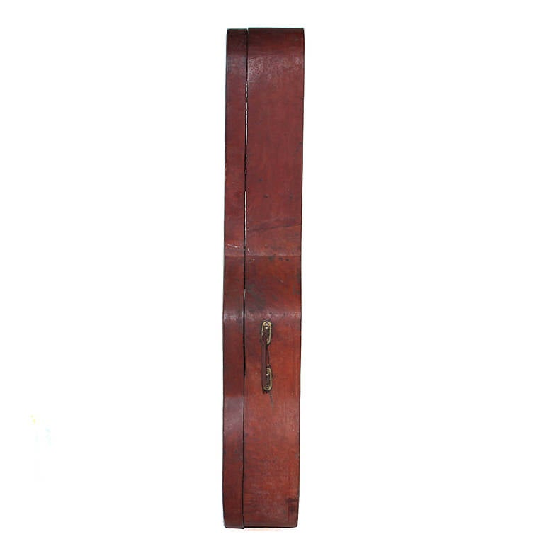 A beautiful leather guitar case in a deep red leather that is tooled and naturally patinated. The inside is lined in red velvet. 

Many pieces are stored in our warehouse, so please click on CONTACT DEALER under our logo below to find out if the